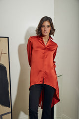 BLUSA PINGUINO CON PUÑO NARANJA
