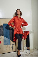 BLUSA PINGUINO CON PUÑO NARANJA